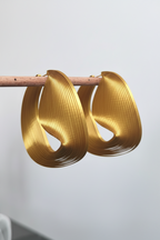 Very light golden color hoops by Miette